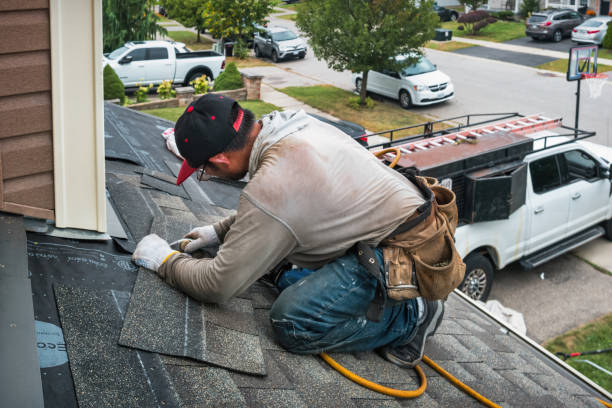 Professional Storm Damage Roof Repair technician working in Gorham, NH